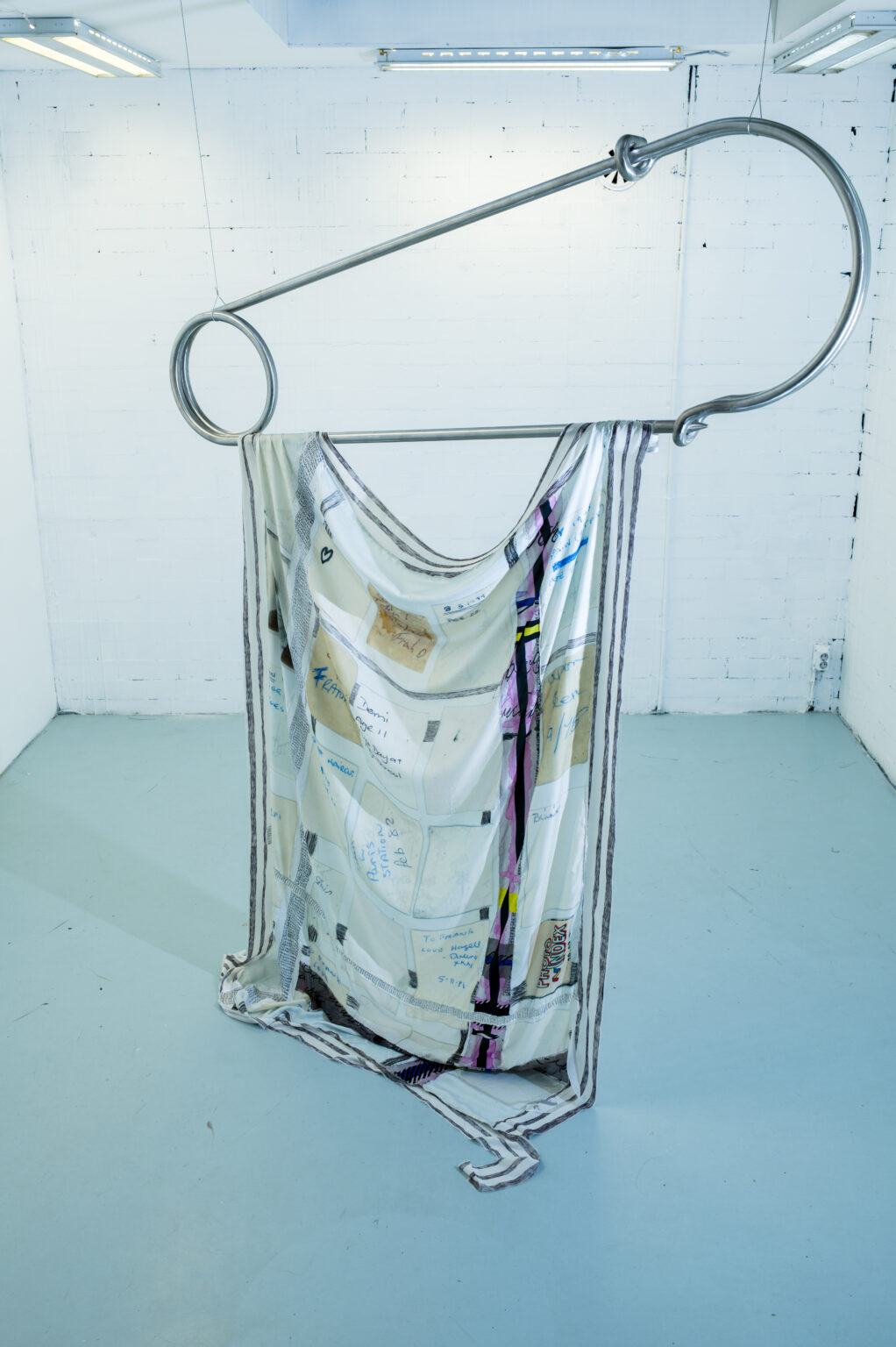 Unfair - Pin me down_2025 _silk _metal sculpture _ photograph _ handprint